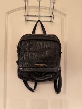 Steve Madden Black Embossed Logo Mini Backpack with Gold Hardware